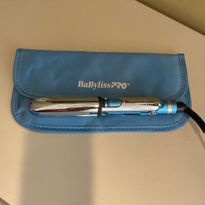 BabylissPRO travel flat iron. Like new, used twice.